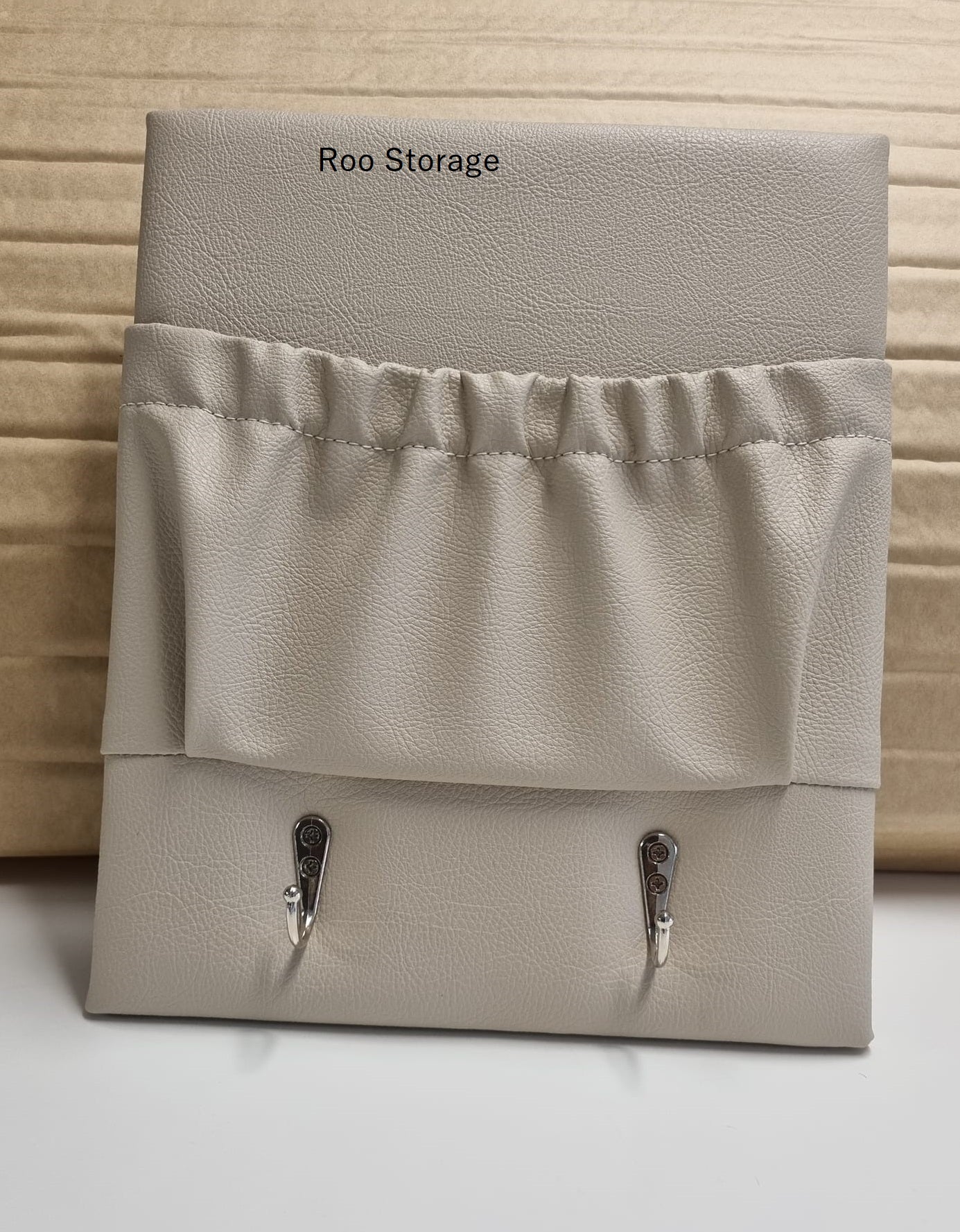 Small 250 x 300mm with 2 hooks above or below pocket Vinyl or faux leather