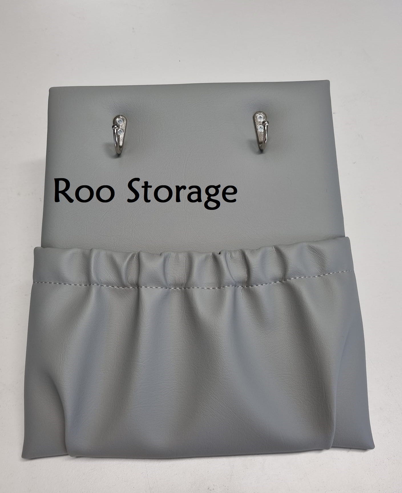 Small 250 x 300mm with 2 hooks above or below pocket Vinyl or faux leather