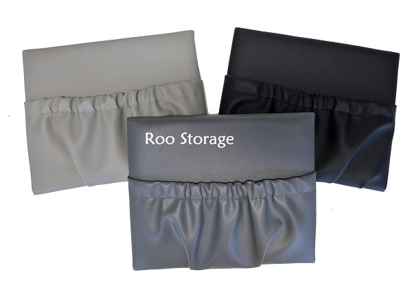 A photo showing 3 small caravan storage pockets, black, dark grey and light grey